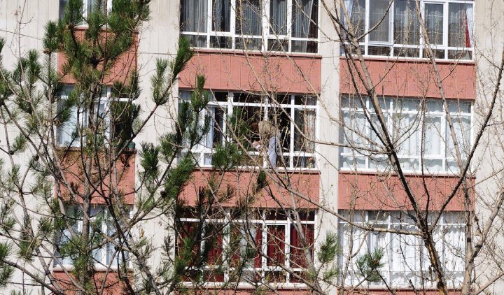Cleaning Windows on the 4th Floor